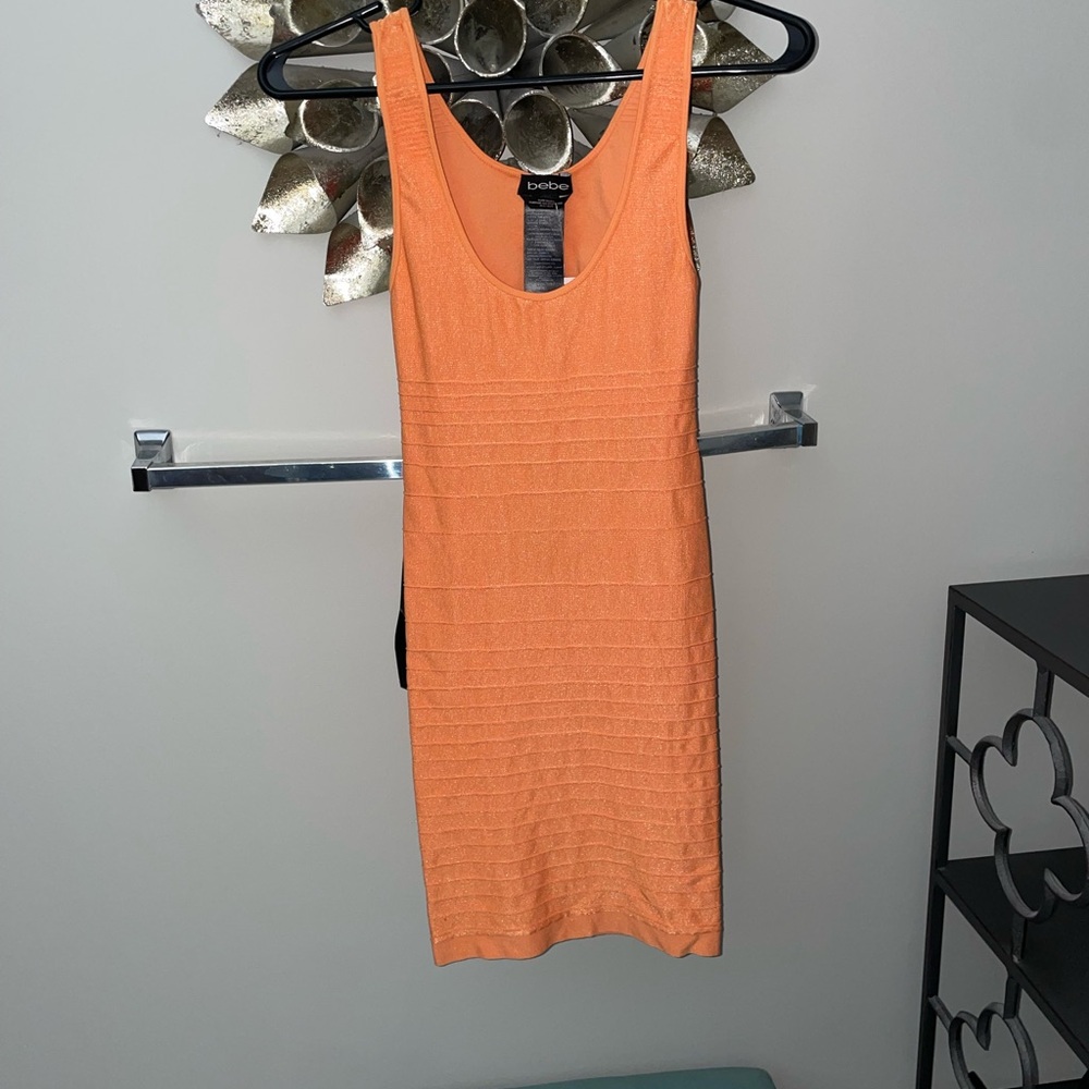 Bebe Orange Bodycon Mini Dress with Ribbed Style and Scoop Neck